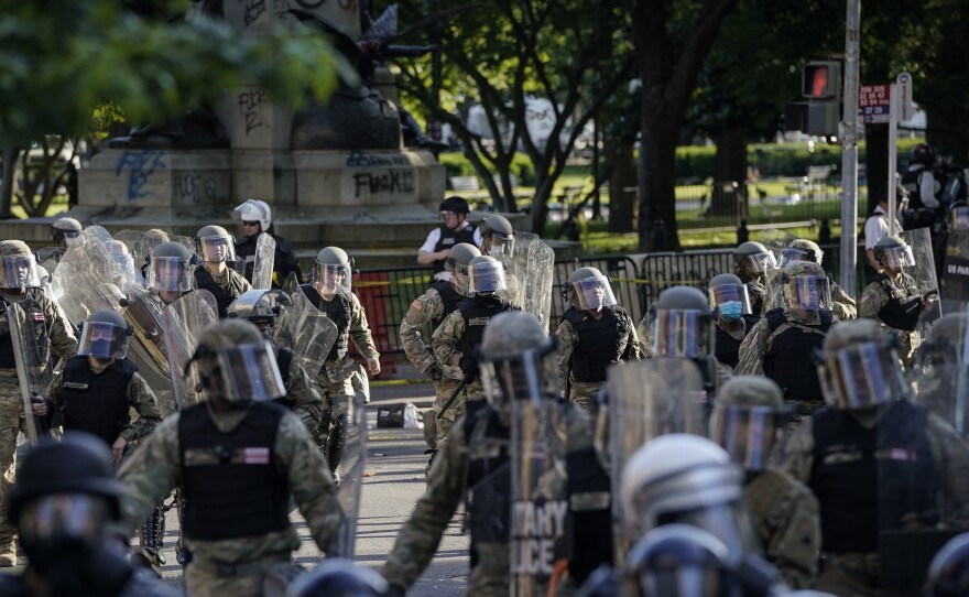 Law enforcement gathered to remove demonstrators from the area around Lafayette Park and the White House ahead of President Trump's trip to St. John's Church on June 1.
