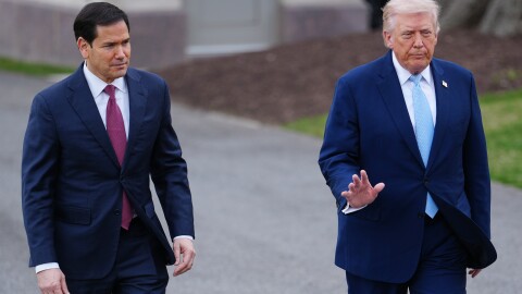 President Donald Trump walks with Secretary of State Marco Rubio to speak with reporters before departing on Marine One from the South Lawn of the White House, Friday, March 20, 2026, in Washington.