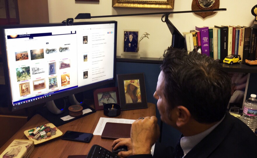 Lt. Francesco Ficarella searches the art squad's Leonardo database.