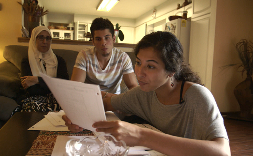 Assia Boundaoui shows FBI documents to her family. When journalist Assia Boundaoui investigates rumors of surveillance in an Arab-American neighborhood outside Chicago, she encounters one of the largest counterterrorism probes conducted before 9/11 — one that has had profound impacts on the community.
