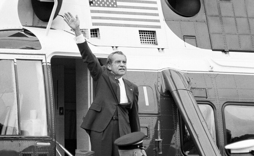 President Nixon waves outside the White House after his farewell address Aug. 9, 1974.