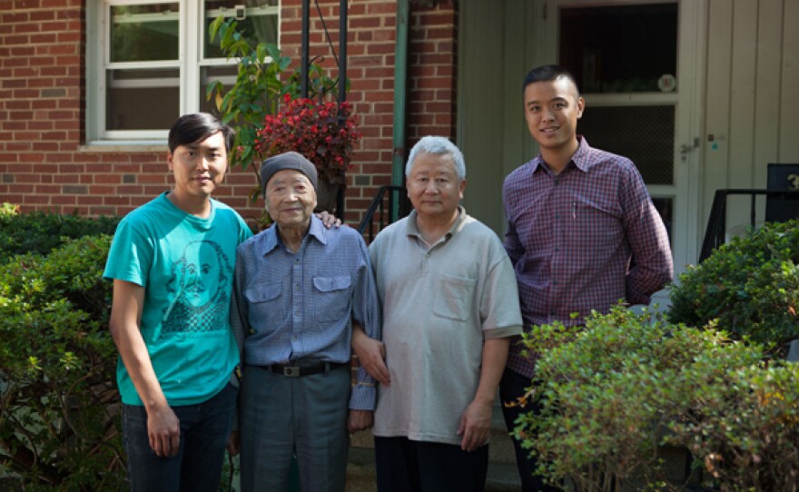 Jonathan Wu, his grandfather, his uncle, and Wilson Tang outside of grandpa's house, a source of inspiration for Jonathan's cooking.
