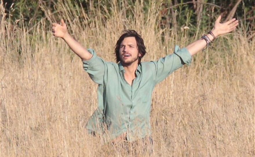 Ashton Kutcher in the middle of a lackluster and surprisingly unmagical acid trip as a college-aged Steve Jobs.