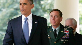 President Obama walks with Gen. David Petraeus to the Rose Garden of the White House in Washington on Wednesday.