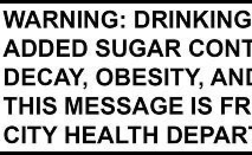 A Baltimore councilman introduced legislation to require warning labels like this one on sugar-sweetened drinks in the city. A study published in Pediatrics found that such a label might deter parents from buying the drinks.