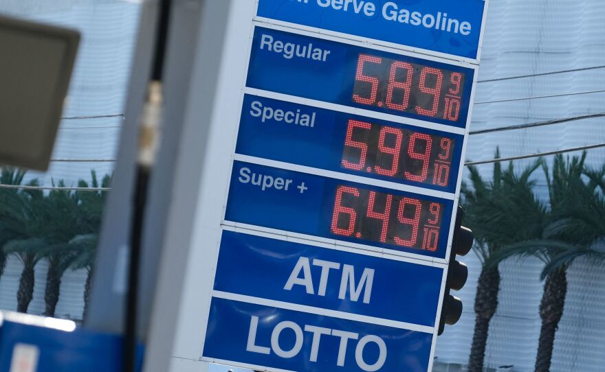 The high price of gasoline is displayed at a Los Angeles gas station on Nov. 24. Consumer prices surged 6.8% in November from a year earlier, the fastest pace in nearly four decades.