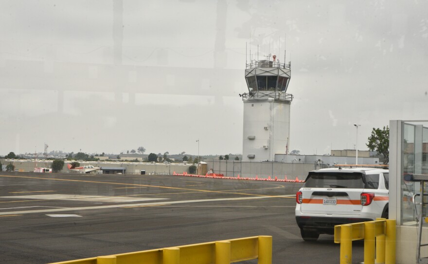 A small plane sits on the tarmac at McClellan-Palomar airport, Oct. 8, 2025.