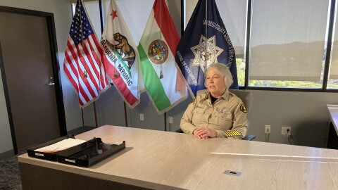 Sheriff Kelly Martinez sits behind her office desk at the San Diego County Sheriff's headquarters on Dec. 5, 2023.