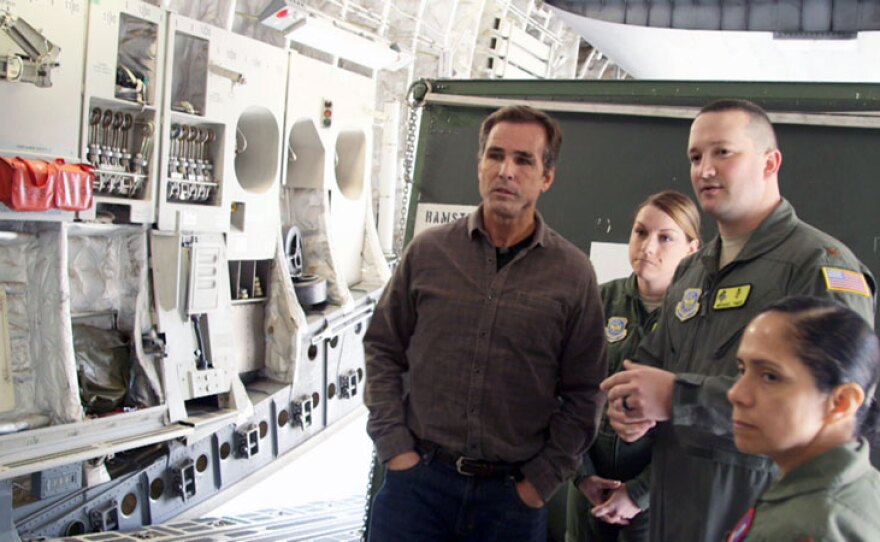 Bob Woodruff talks with a Critical Care Air Transport Team (CCATT) aboard a medical evacuation plane at Ramstein Air Base in Germany. The advance in critical care transport added up to thousands of lives saved.