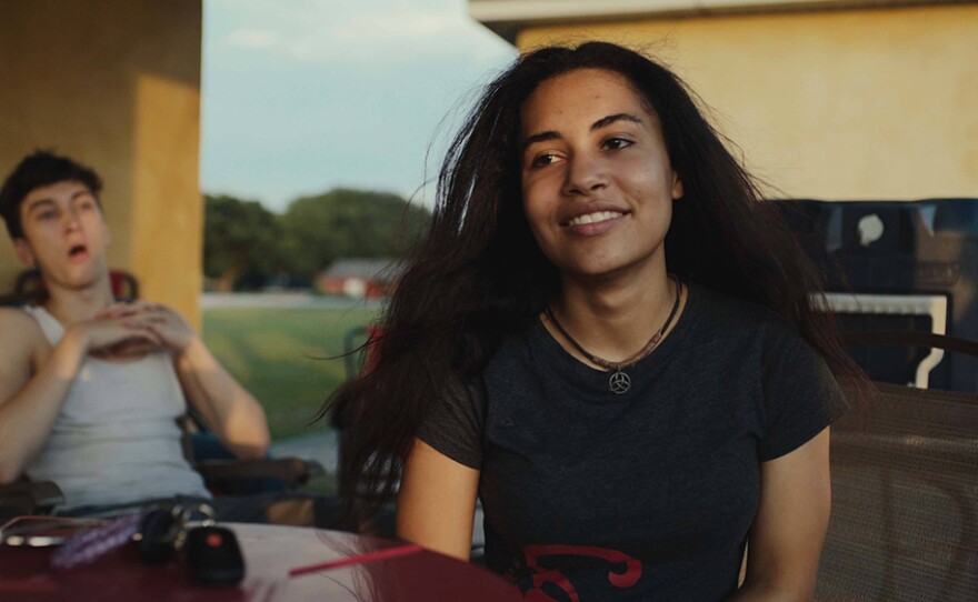 Adia, a senior at T.M. Landry College Prep, attends a crawfish boil with friends.