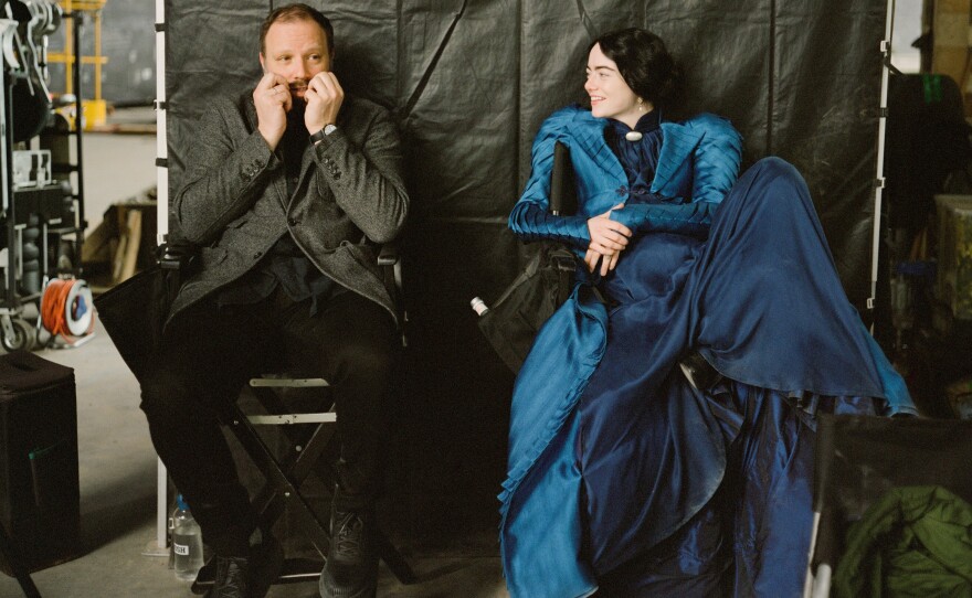 Director Yorgos Lanthimos and Emma Stone on the set of <em>Poor Things.</em>