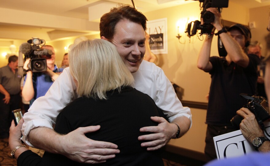 Clay Aiken hugs a supporter during an election night watch party in Holly Springs, N.C., Tuesday, May 6, 2014. Aiken went on to win the primary by fewer than 400 votes.