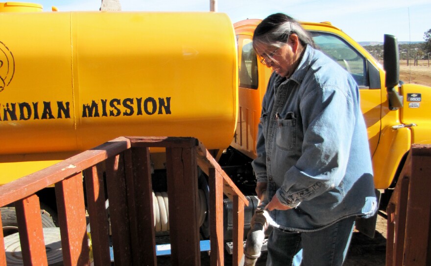 Darlene Arviso is known as the water lady in Smith Lake, N.M., on the Navajo Nation. She delivers water to 250 people each month. Here, she fills buckets from her water truck.
