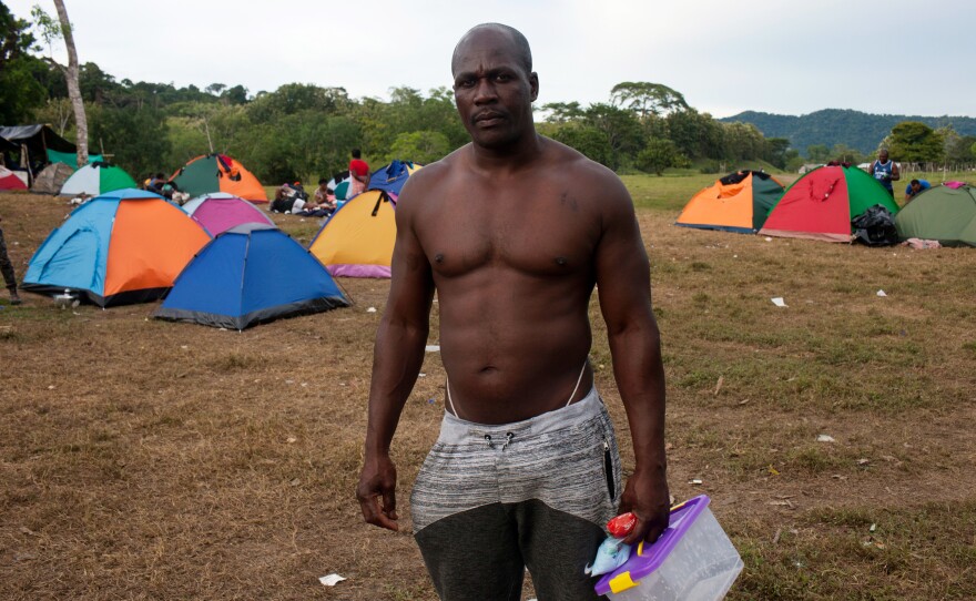 Gegrand Joseph, standing at a migrant camp in Colombia, says he crossed the Darién Gap once already and arrived into the U.S. but was deported by the Trump administration. He is now making his second attempt to settle in the U.S.