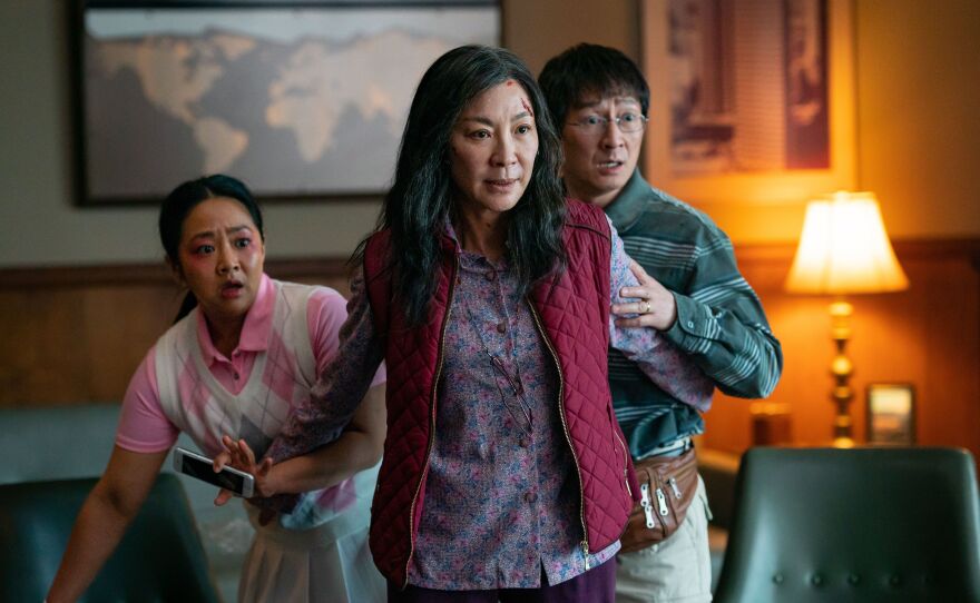 Stephanie Hsu, Michelle Yeoh and Ke Huy Quan in <em>Everything Everywhere All at Once.</em>