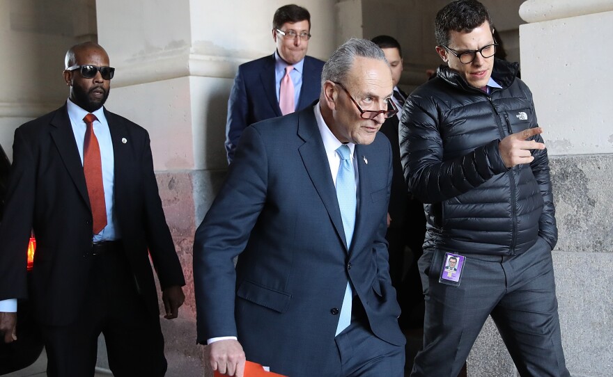 Senate Minority Leader Chuck Schumer, D-N.Y., returns to the U.S. Capitol after meeting with President Trump at the White House on Friday afternoon.
