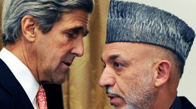 U.S. Sen. John Kerry speaks with Afghan President Hamid Karzai at a press conference at the presidential palace on Tuesday.