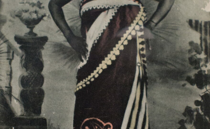 <em>Zanzibar, Suaheli Schonheit</em> by A.C. Gomes & Son. Photograph taken before 1900; postcard printed between 1907 and 1910 by C.A.W. Grun.
