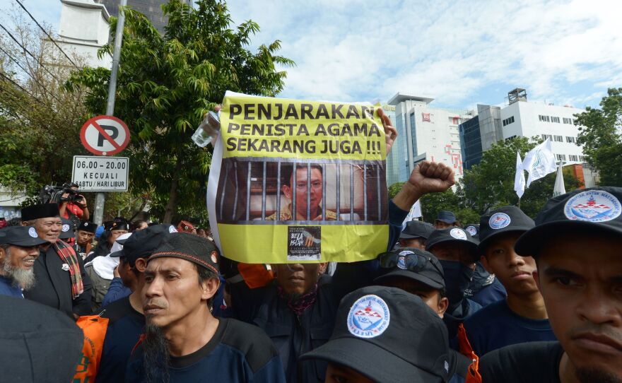 Indonesian Muslims demonstrate on Dec. 13, 2016, outside the court where Jakarta's Christian, ethnic Chinese Governor Basuki Tjahaja Purnama is on trial for blasphemy. His allegedly blasphemous remarks sparked massive rallies against him in November and December.