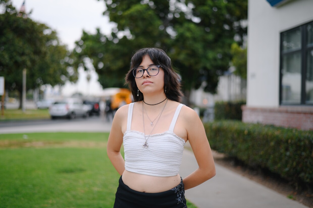 Chula Vista High theater student Quinton Rivera stands for a portrait outside the high school in Chula Vista, California on December 11, 2024. The school district is proposing schedule cuts that many Chula Vista High students worry will hurt the school’s renowned arts program.