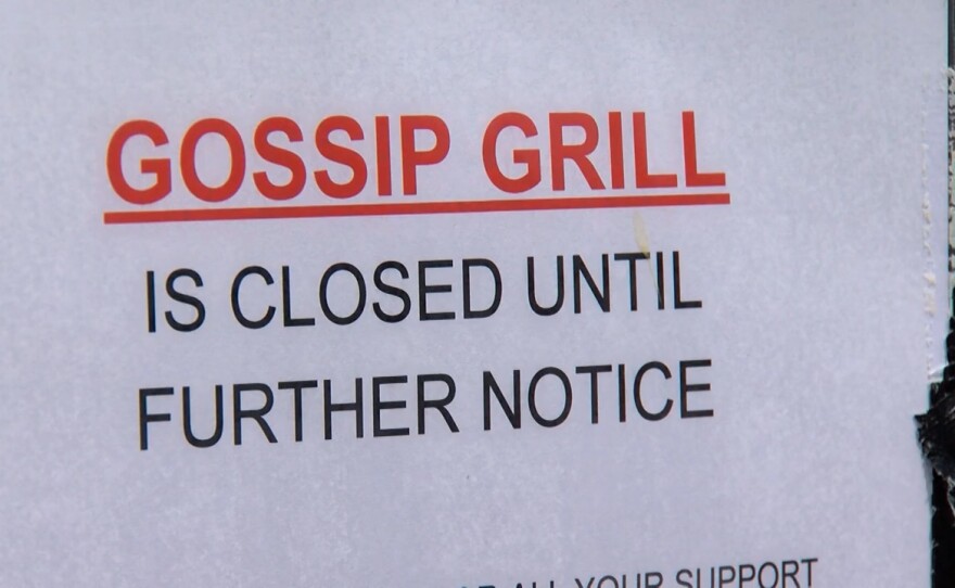 A closed sign outside of Gossip Grill in Hillcrest on April 2, 2020. The eatery, like many others, are closed because of the COVID-19 pandemic.