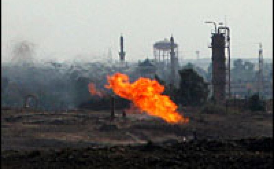 A giant gas flare is the most striking feature of the landscape as visitors approach the northern Iraqi oil city of Kirkuk.