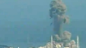 A screen grab taken from news footage by Japanese public broadcaster NHK shows the moment of a hydrogen explosion at the Fukushima No. 1 nuclear power station number three reactor on Monday.