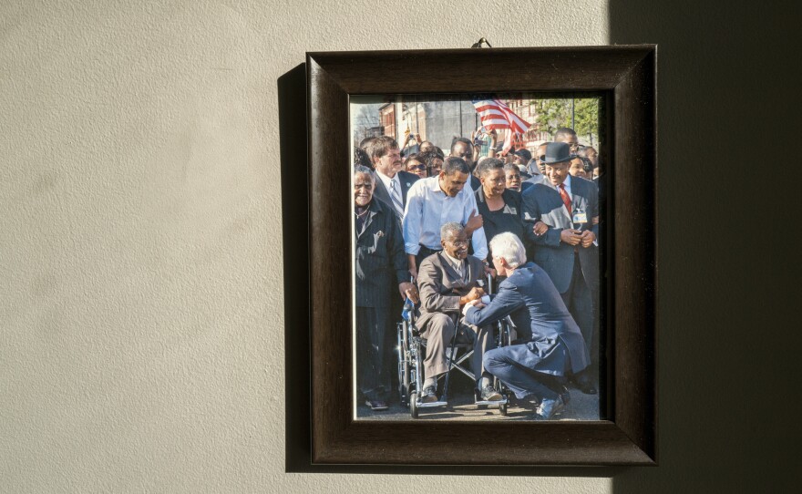 A photo of Barack Obama, Bill Clinton, Fred Shuttlesworth and JoAnne Bland hangs in Bland's home in Selma, Ala.