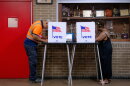 People vote in the primary election at Northwestern High School in Detroit, Tuesday.