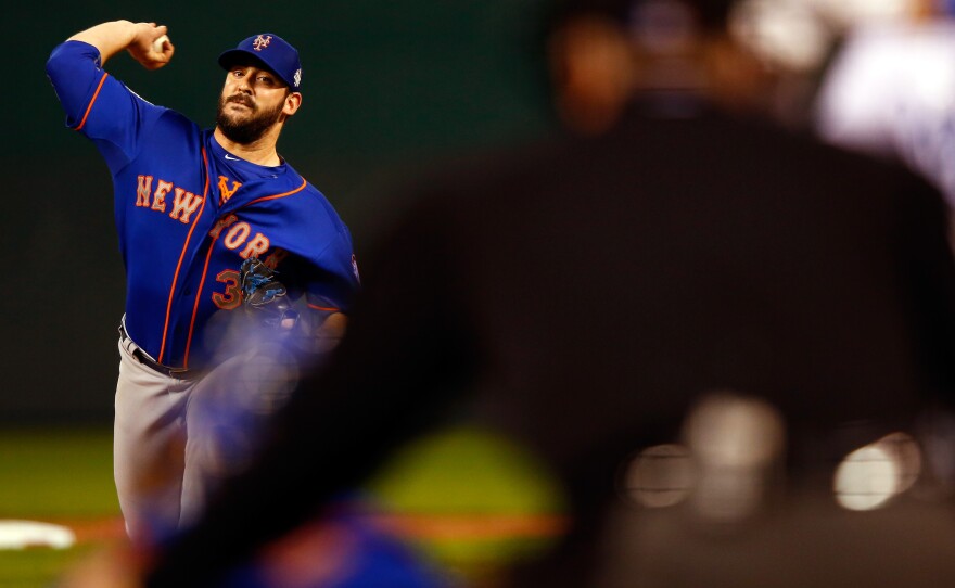 Matt Harvey throws a pitch in the first inning against the Kansas City Royals. Harvey gave up three runs and struck out two in six innings.