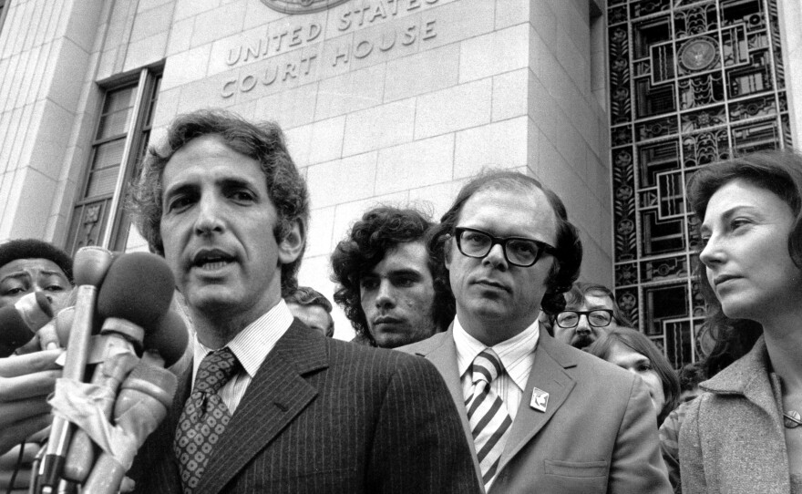 In this Jan. 17 1973 file picture, Daniel Ellsberg speaks to reporters outside the Federal Building in Los Angeles.