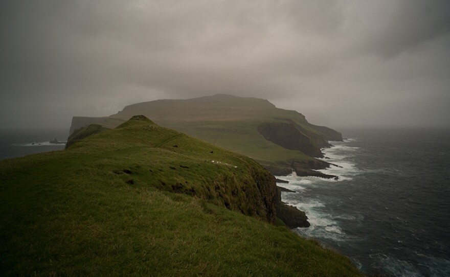 The island of Mikines in the Faroe Islands. The Atlantic is too rough to use the harbor for much of the year, during that time the island is only accessible by helicopter.