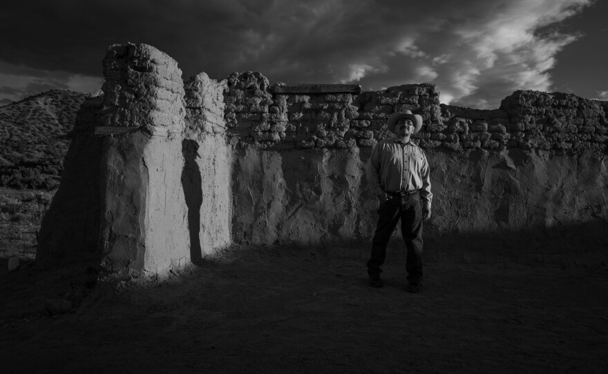 Photographer Russel Albert Daniels (Diné & Ho-Chunk) is based in Salt Lake City. His projects explore identity, memory and history. In this photo, Delvin Garcia stands in the remains of an 18th century Catholic church in New Mexico. Garcia is a descendent of a Genízaro family from Abiquiú, N.M. Genízaro was a Spanish imperial caste of Indigenous enslaved people in the Southwest borderlands.