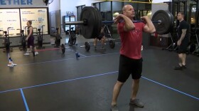 A man lifting in a gym in this undated file photo.