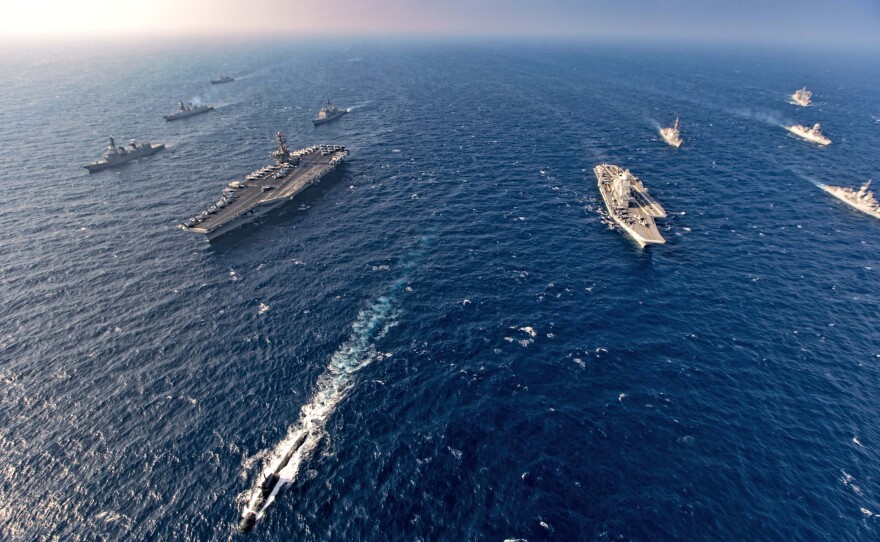 Aircraft carriers and warships participate in the second phase of Malabar naval exercise, a joint exercise by India, the U.S., Japan and Australia, in the northern Arabian Sea last November. The four countries form the Quadrilateral Security Dialogue, or the Quad.