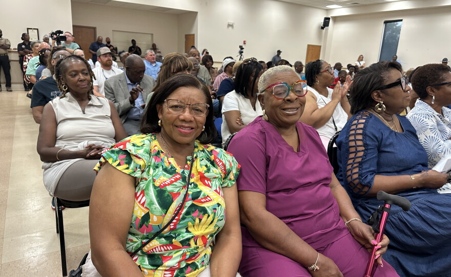 Willie Dixon, left, and Mary Gatson came to hear Alabama's two Black members of Congress speak at a local church on July 30. The ladies are concerned that confusion around congressional boundaries and primary dates may discourage Black voters.