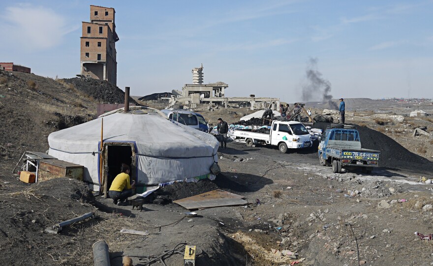 <em>Gers</em> – nomadic tents – house mining brigades in northeastern Mongolia at an abandoned coal mine from the Soviet era.