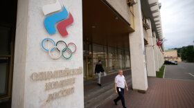 A man walks outside the Russian National Olympic Committee building in Moscow on Tuesday.