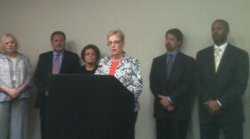 California School Boards Association Martha Fluor speaks at a news conference Wednesday in Sacramento announcing a lawsuit challenging education funding in the state budget. 