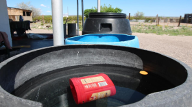 A water storage bucket near Presidio, Texas. The Texas Secretary of State said 38,000 Texans living in border settlements known as colonias have no running water. 