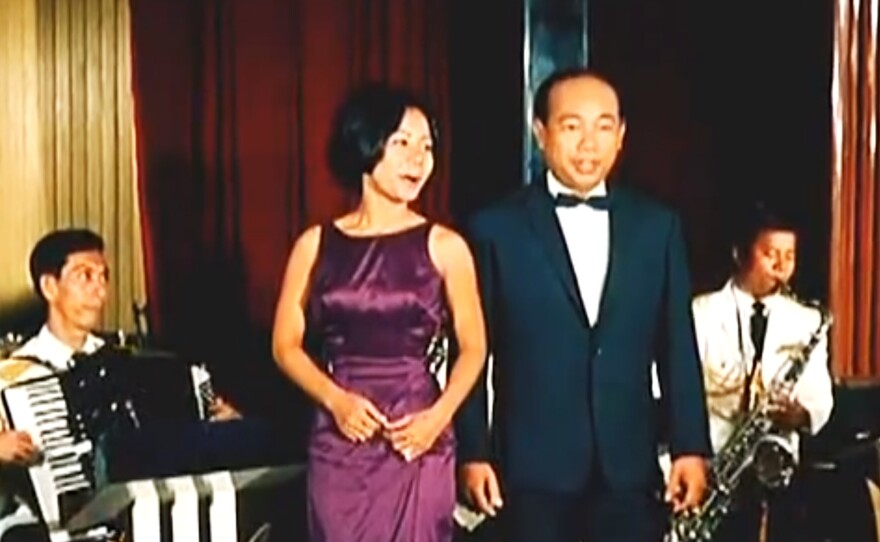 Cambodian psychedelic rock star Sinn Sisamouth (right) performs in the 1966 movie Apsara.