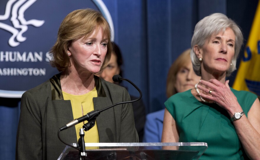 Health and Human Services Secretary Kathleen Sebelius, (who we're sure was not intentionally making the "choke" sign) and Marilyn Tavenner, head of the HHS agency that oversaw the Obamacare website project.