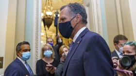Sen. Mitt Romney, R-Utah, leaves the Senate Chamber following a vote, at the Capitol in Washington, Monday, Sept. 21, 2020.
