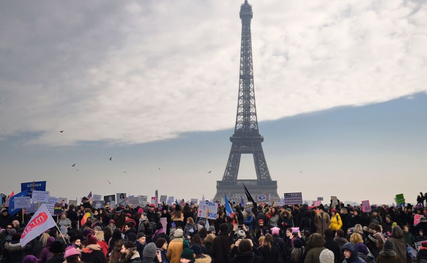 Demonstrators gather for a rally at the Place de Trocadero in Paris in solidarity with supporters of the Women's March in Washington.