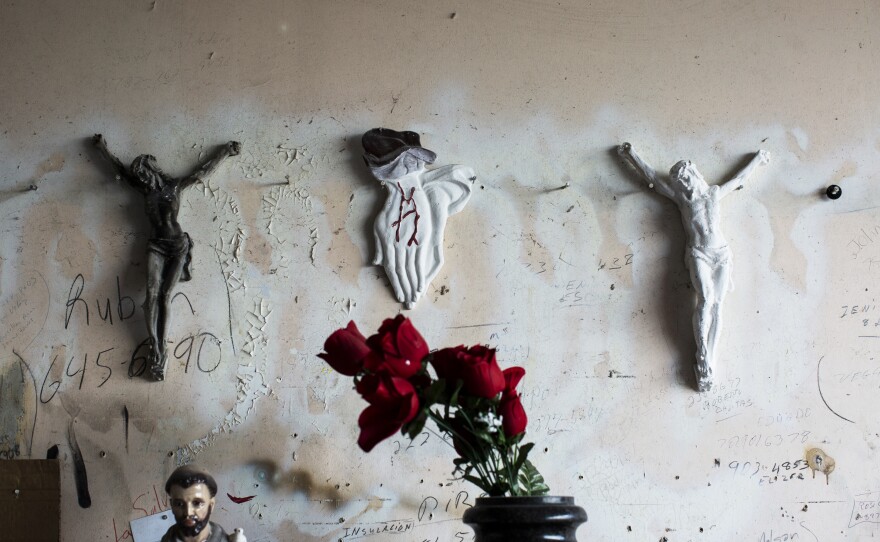 Religious objects found in a tombstone maker's workshop near the Lares Municipal Cemetery.