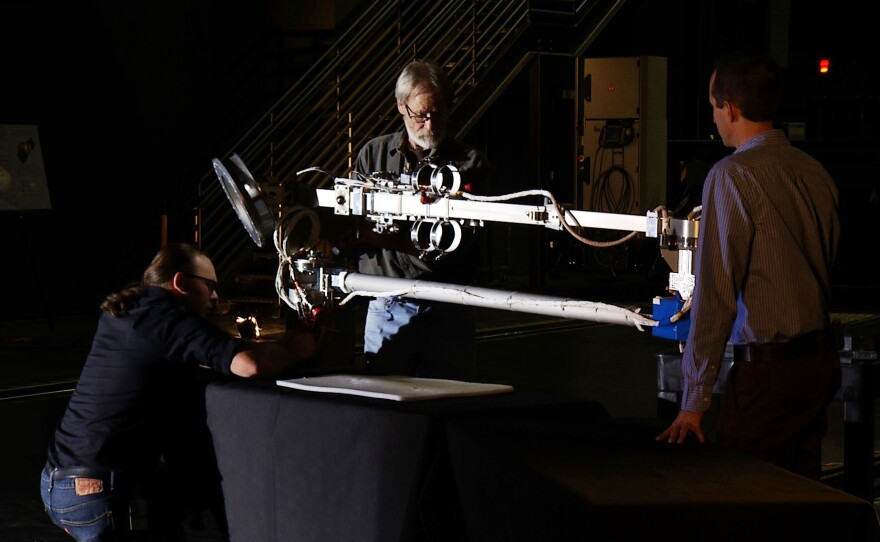 "OSIRIS-REx: Countdown to Launch" reveals the personal and scientific challenges overcome by the scientists responsible for the Asteroid Sample Return Mission. Pictured: The teamwork on the Touch-And-Go Sample Acquisition Mechanism (TAGSAM).