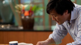 Chef Ming Tsai cooking in his kitchen. 