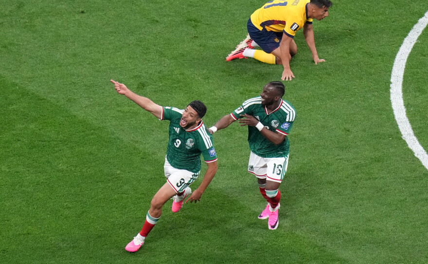 Mexico's Raul Jimenez (9) celebrates with Julian Quinones (16) after scoring their second goal during the World Cup round of 32 soccer match between Mexico and Ecuador in Mexico City, Tuesday, June 30, 2026.
