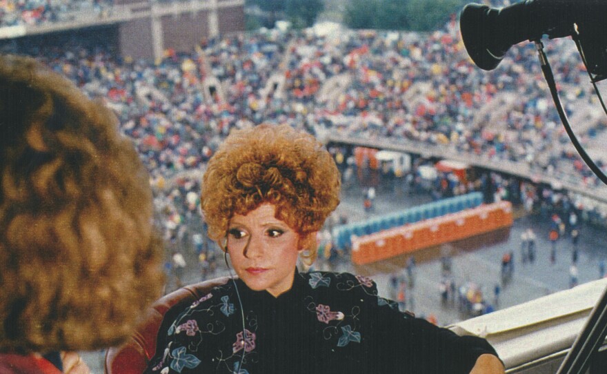 Brenda Lee waiting to roll camera during Farm Aid.