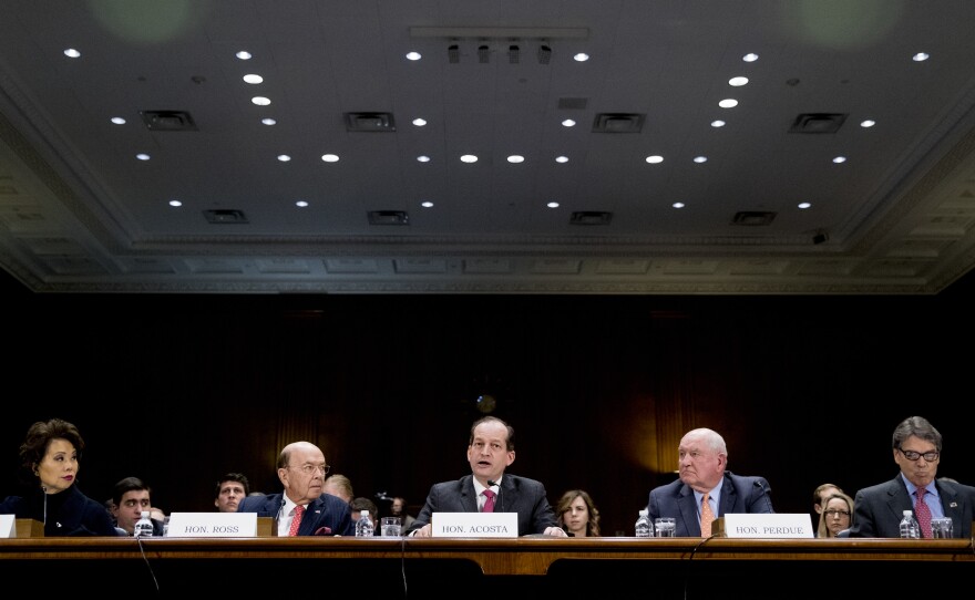From left: Transportation Secretary Elaine Chao, Commerce Secretary Wilbur Ross, Labor Secretary Alex Acosta, Agriculture Secretary Sonny Perdue and Energy Secretary Rick Perry appear before a Senate committee Wednesday.